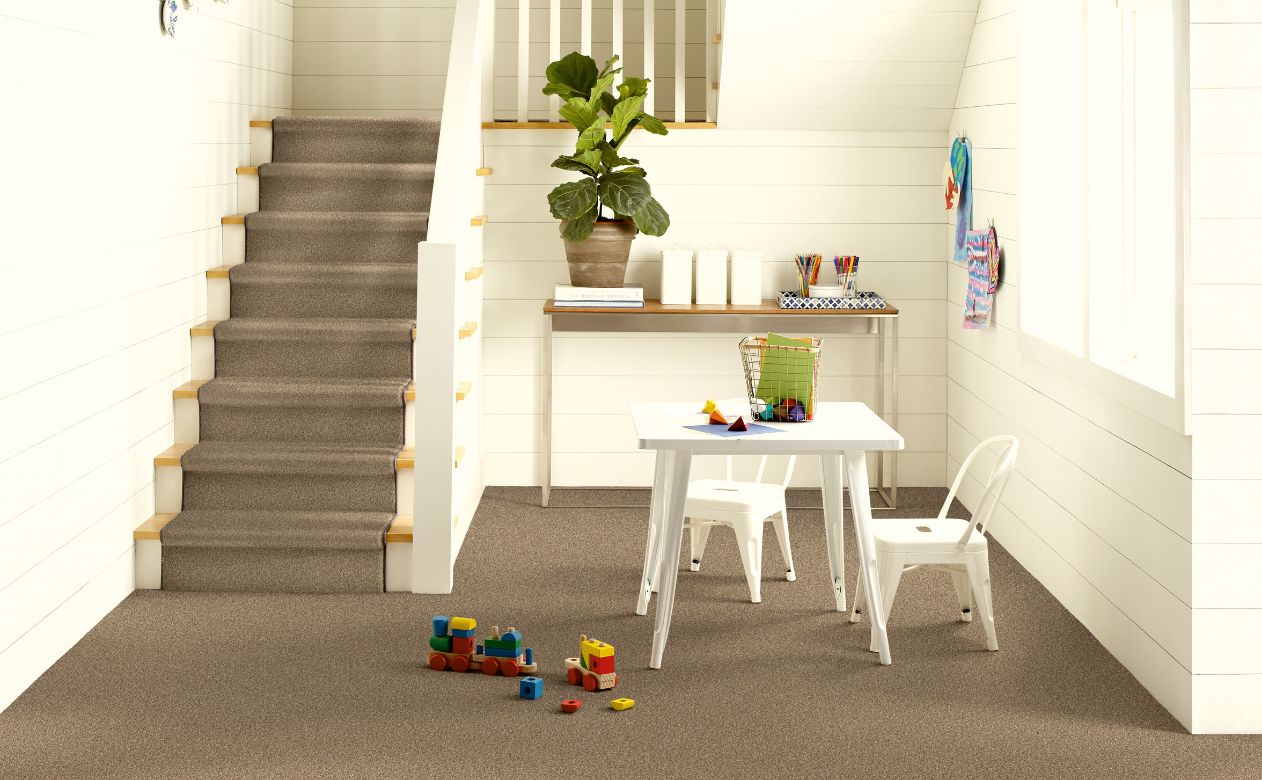 grey stair runner in a Texas entry stairway